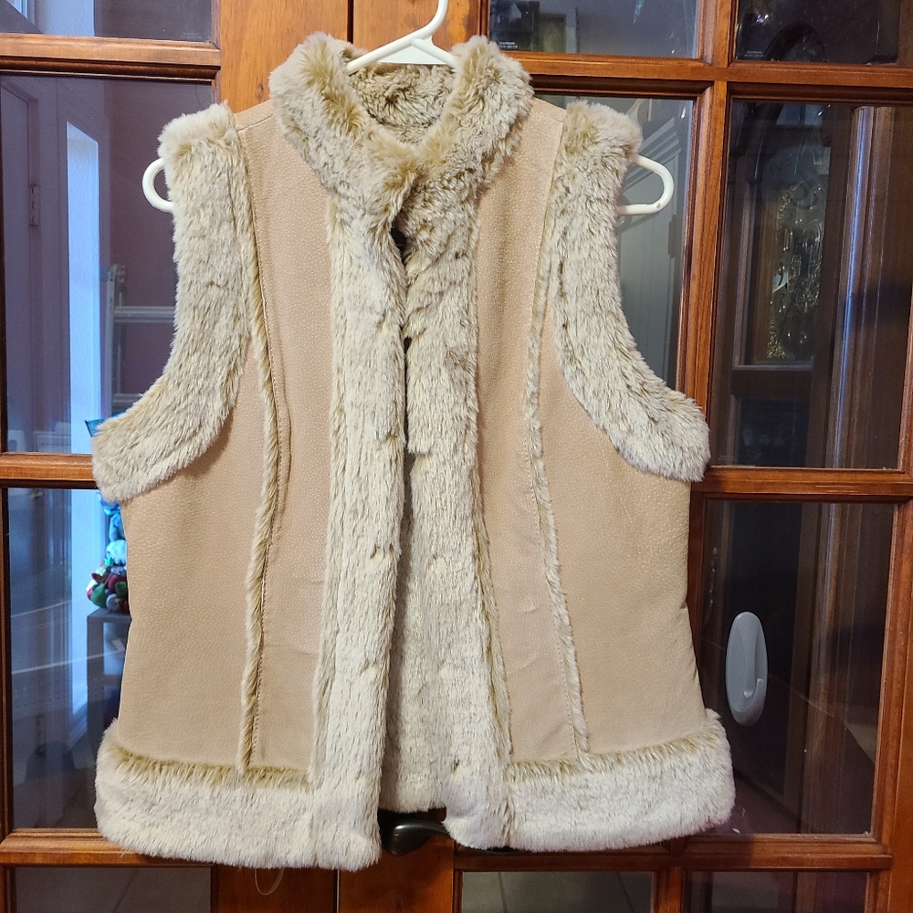 Ladies cute leather and fur vest